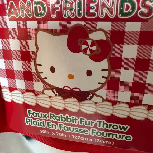 First offer gets it. Hello Kitty Christmas candy cane blanket. - Picture 2 of 2